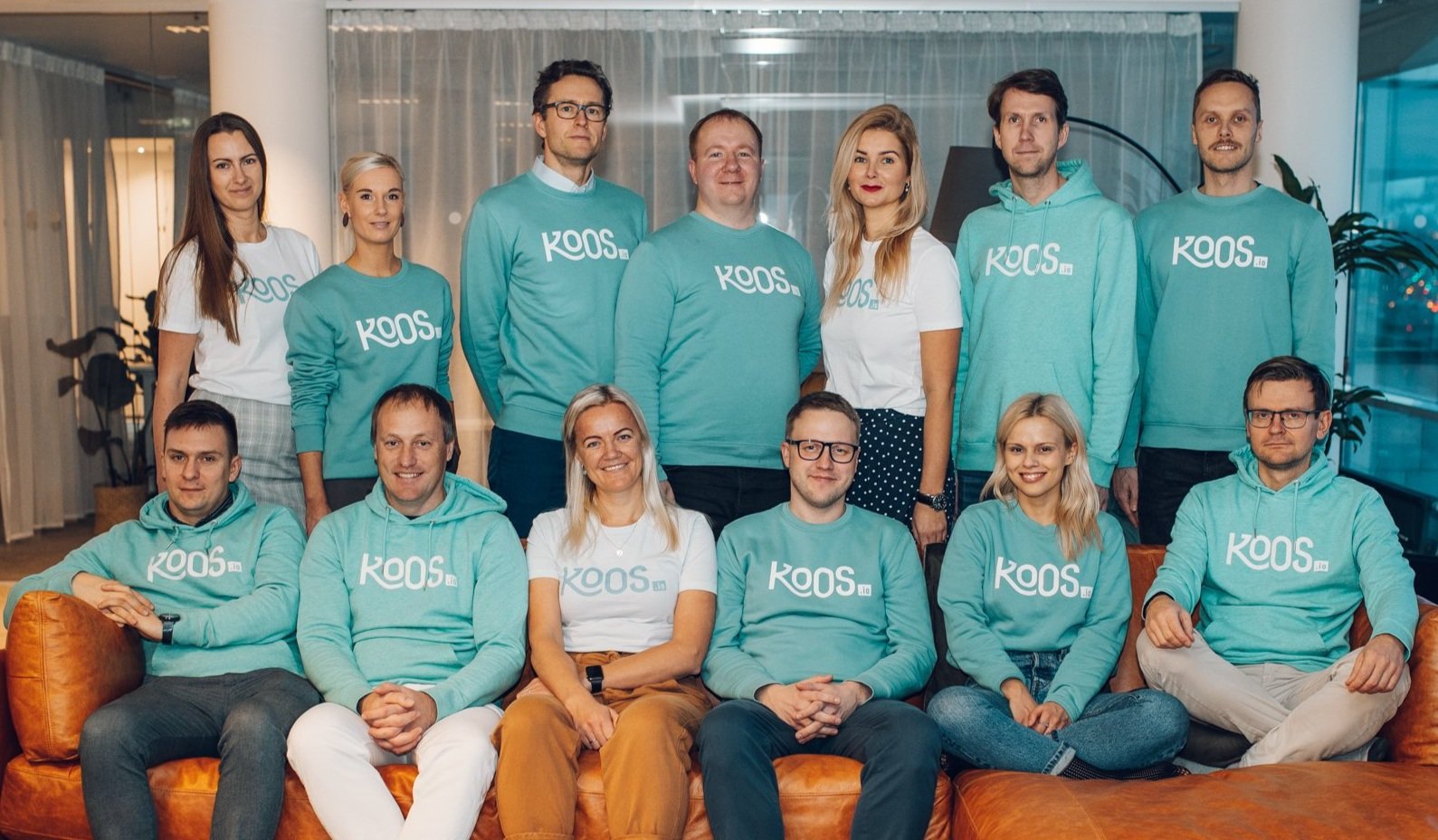 The KOOS.io team in matching sweatshirts