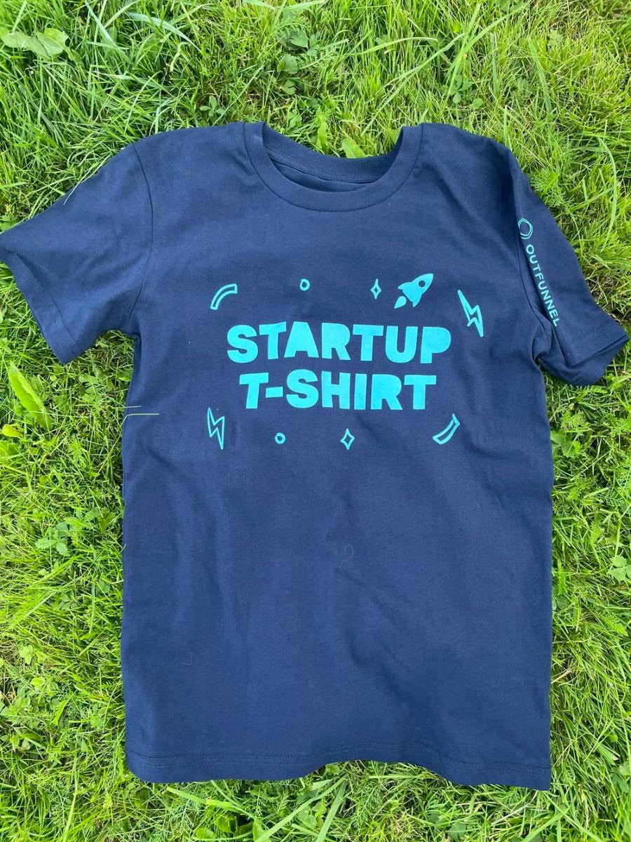 Startup T-shirt on grass